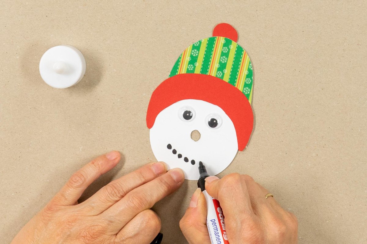 Schneemann Gesicht gestalten