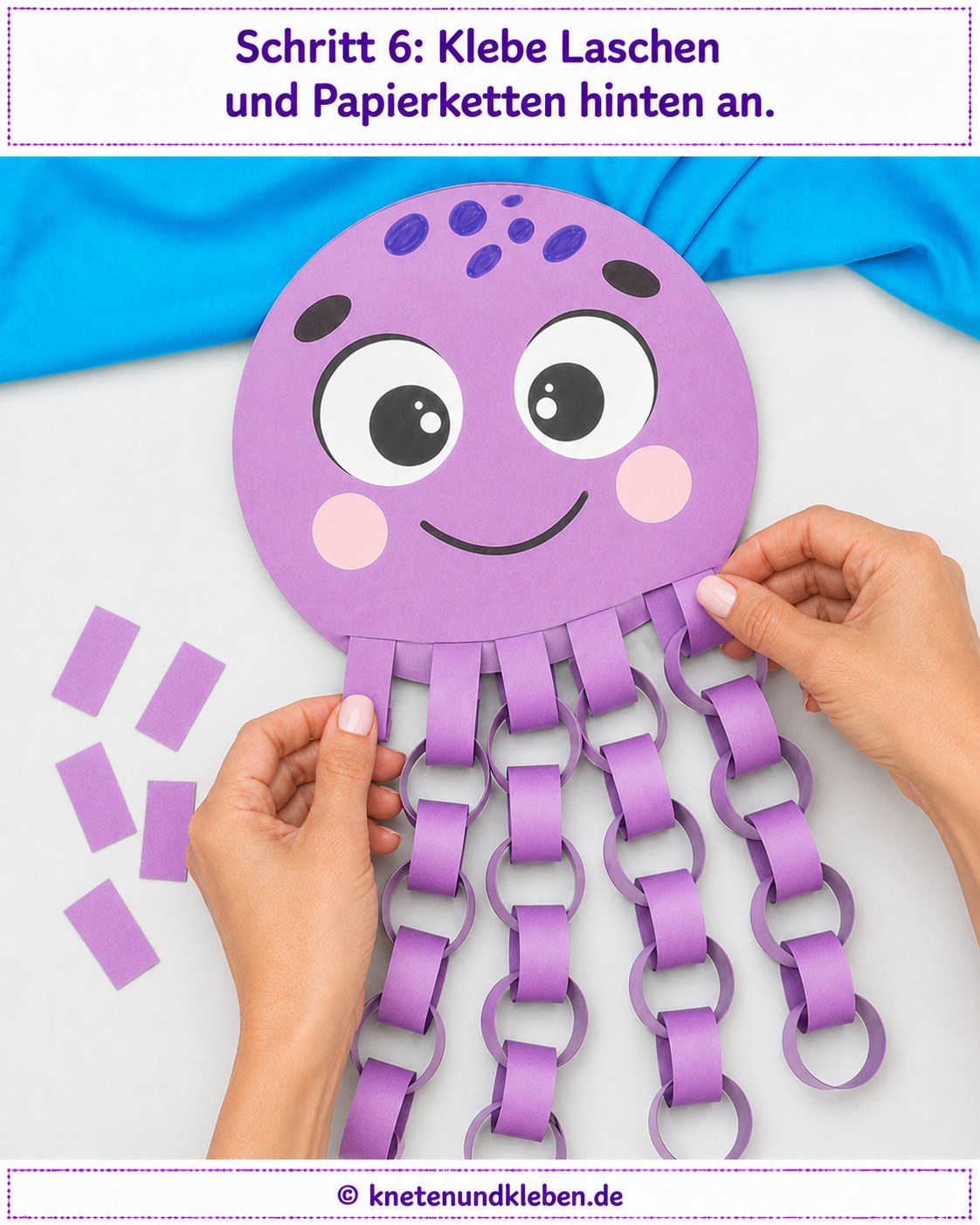 Papierketten und Klebelaschen werden hinten an den Oktopus-Kopf geklebt