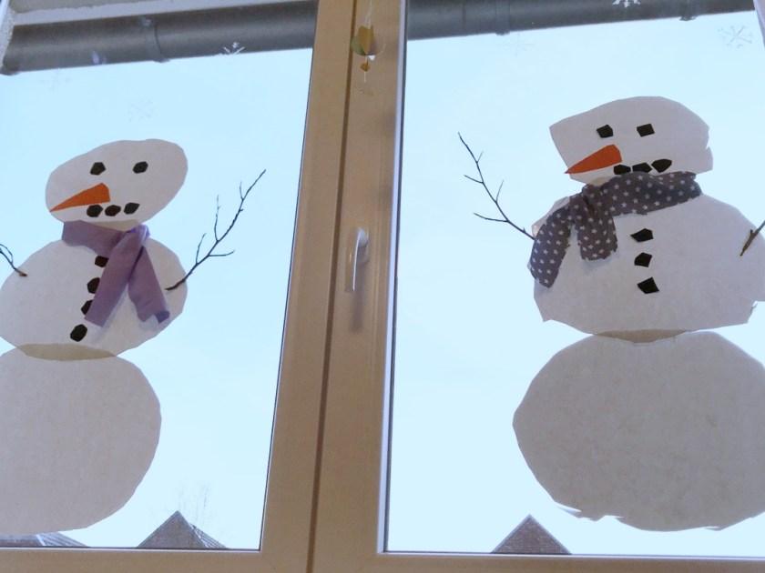 Fensterbild Schneemänner basteln mit Kindern