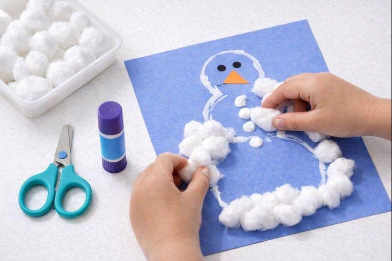 Watte Schneemann basteln mit Kindern