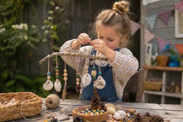 Windspiel mit Perlen Naturmaterialien